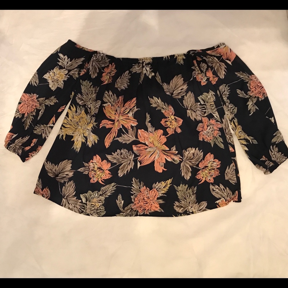 Sheer off shoulder print top.